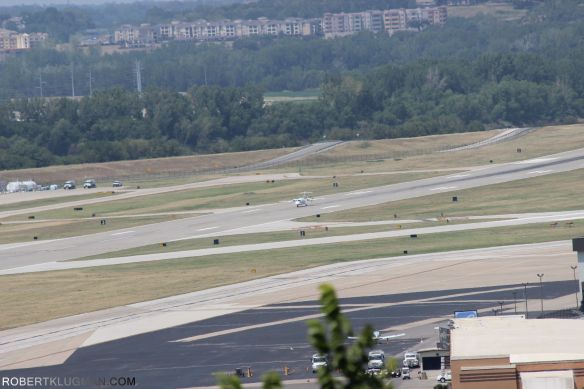 PLANE TAKING OFF FROM DOWNTOWN AIRPORT(7)